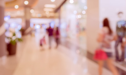 blurred image of shopping mall and people with vintage tone