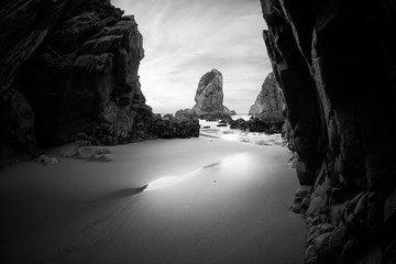Black and white photo of rocky coastline of Atlantic ocean - 145326492