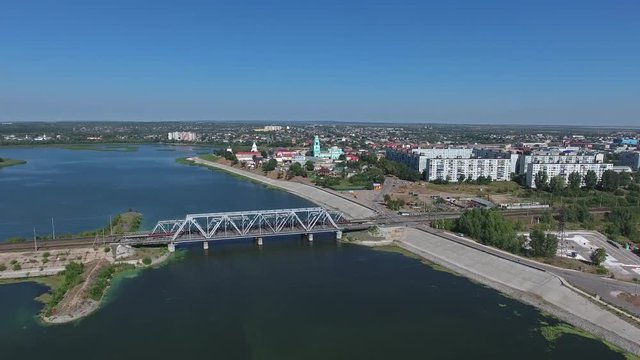 Aerial view on Syzran city and railroad bridge, Russia, 4k
