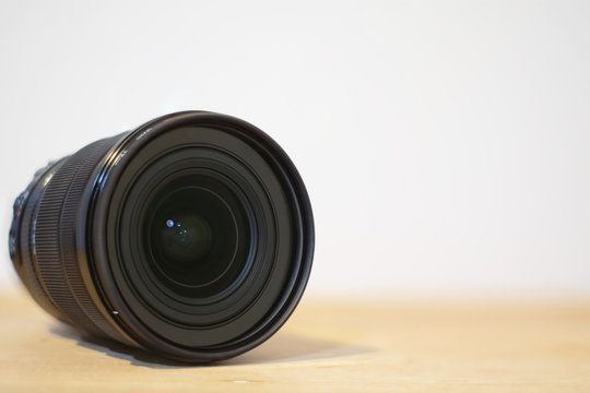 Wide angle camera lens on white background.