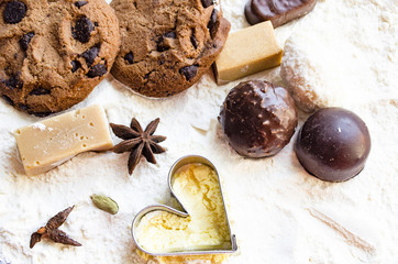 Chocolate biscuits. Candies. cardamom. Isolated on white
