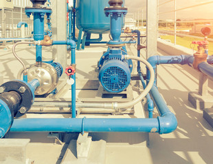 Water pump station and pipeline on roof deck of water tank for industrial work