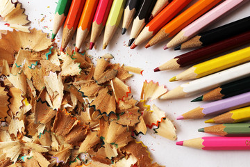 Colored pencils and sawdust, school supplies