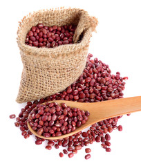 fresh red beans in bag and spoon  isolate on white background