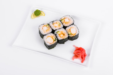 Asia. Rolls with shrimp on a white plate on a white background