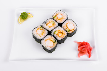 Asia. Rolls with shrimp on a white plate on a white background