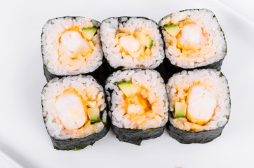 Asia. Rolls with shrimp on a white plate on a white background