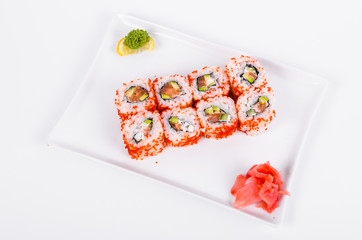 Asia. California rolls with salmon (red fish) on a white plate on a white background