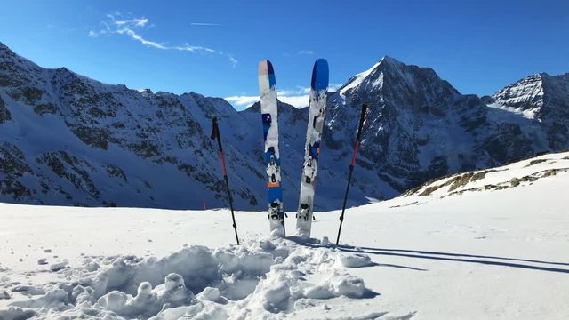 Time lapse of ski against winter mountain range. Sulden, Solda Italy.