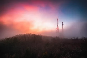 Poster de jardin Nature Sunrise over connection and radio tower in the moutain