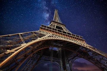 Wall murals Historic monument The Eiffel Tower at night in Paris, France