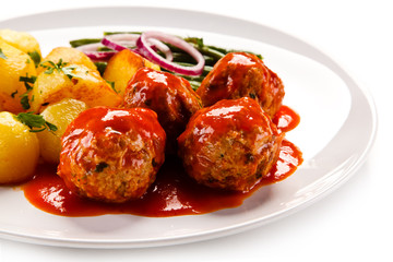 Roast meatballs with potatoes