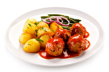 Roast meatballs with potatoes