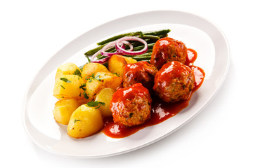 Roast meatballs with potatoes