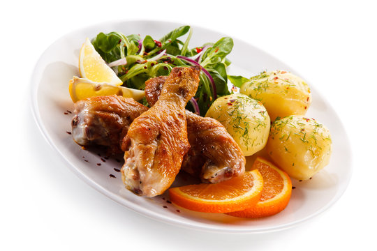 Roast drumsticks with potatoes
