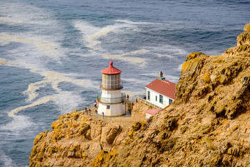 Fototapeta na wymiar Point Reyes Lighthouse at Pacific coast, built in 1870