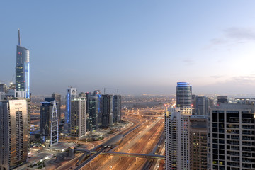 Scenic view from roof top of Dubai's Jumairah Lakes Towers (JLT) by night