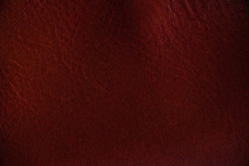 Macro fragment of a leather bag or purse. Handmade, texture background.