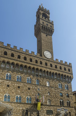 Fototapeta na wymiar Detail of the famous Palazzo Vecchio in Piazza della Signoria, historic center of Florence, Italy, on a sunny day