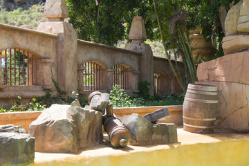 Beautiful fragment of ancient wall with wooden door.