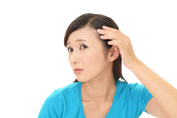 ヘアケアに不満な女性