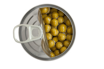 Opened tin with green peas