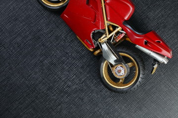 Obraz premium Miniature plastic motorcycle model.