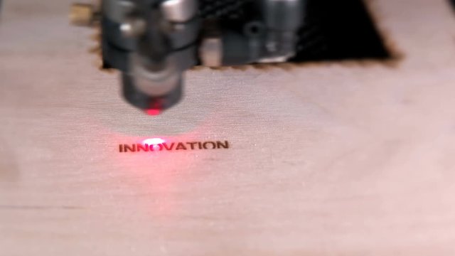 Laser machine operation during engraving