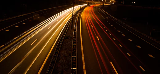 Fotobehang snelweg bij nacht © Tess Groote