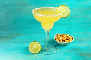 Margarita cocktail photo on vibrant background with copyspace