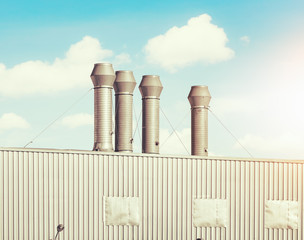 Air duct or hood for air conditioner system and roof with blue sky background.