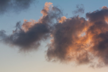 Obraz na płótnie Canvas bright tropical sunrise with clouds in the sky