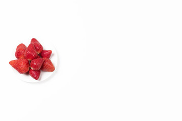 High angle view on Japanese strawberries on white background.