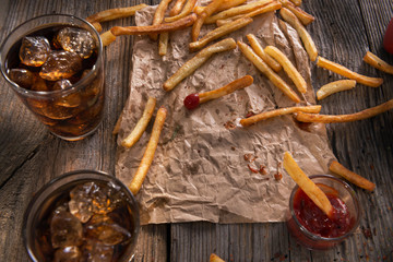 French fries on a old wooden table