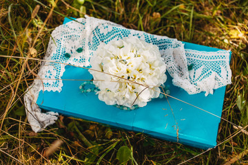 Wedding bouquet in the grass on the meadow