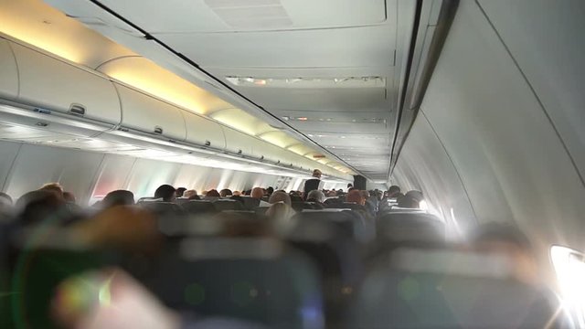 The flight attendant goes through the cabin, HD 1080p