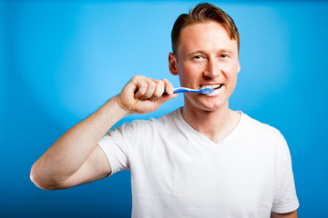 Man Brushing His Teeth