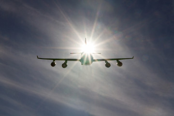 The plane flies in the sun. The plane in the sky. Aviation. Passenger airliner. air space. Air transportation.