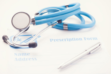 RX prescription form and stethoscope