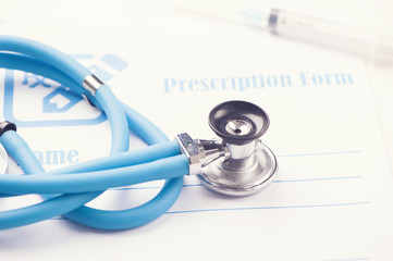 RX prescription form and stethoscope
