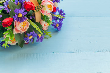 flower on color wood background