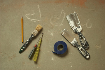 

Construction accessories on the background of concrete