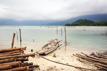 Bay in Central Vietnam, boat and oyster farm