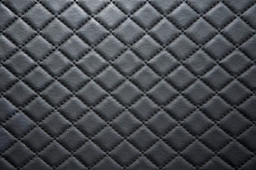 black leather texture with seam background