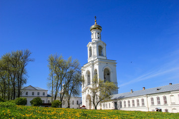 Fototapeta na wymiar The ancient bell tower in the monastery in Russia