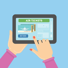 Flight ticket search. Hands holding tablet with online booking.