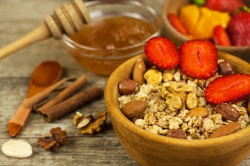 Oatmeal with strawberries. The concept of healthy eating. An exquisite snack for athletes. Vegetarian food.