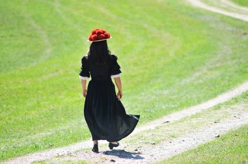 Schwarzwald-Mädchen mit dem traditionellen Bollenhut