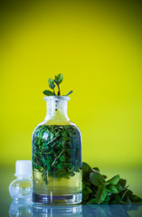 Mint syrup in a glass bottle