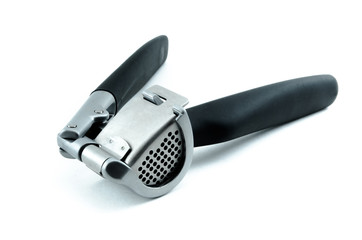 Garlic press isolated on white background.